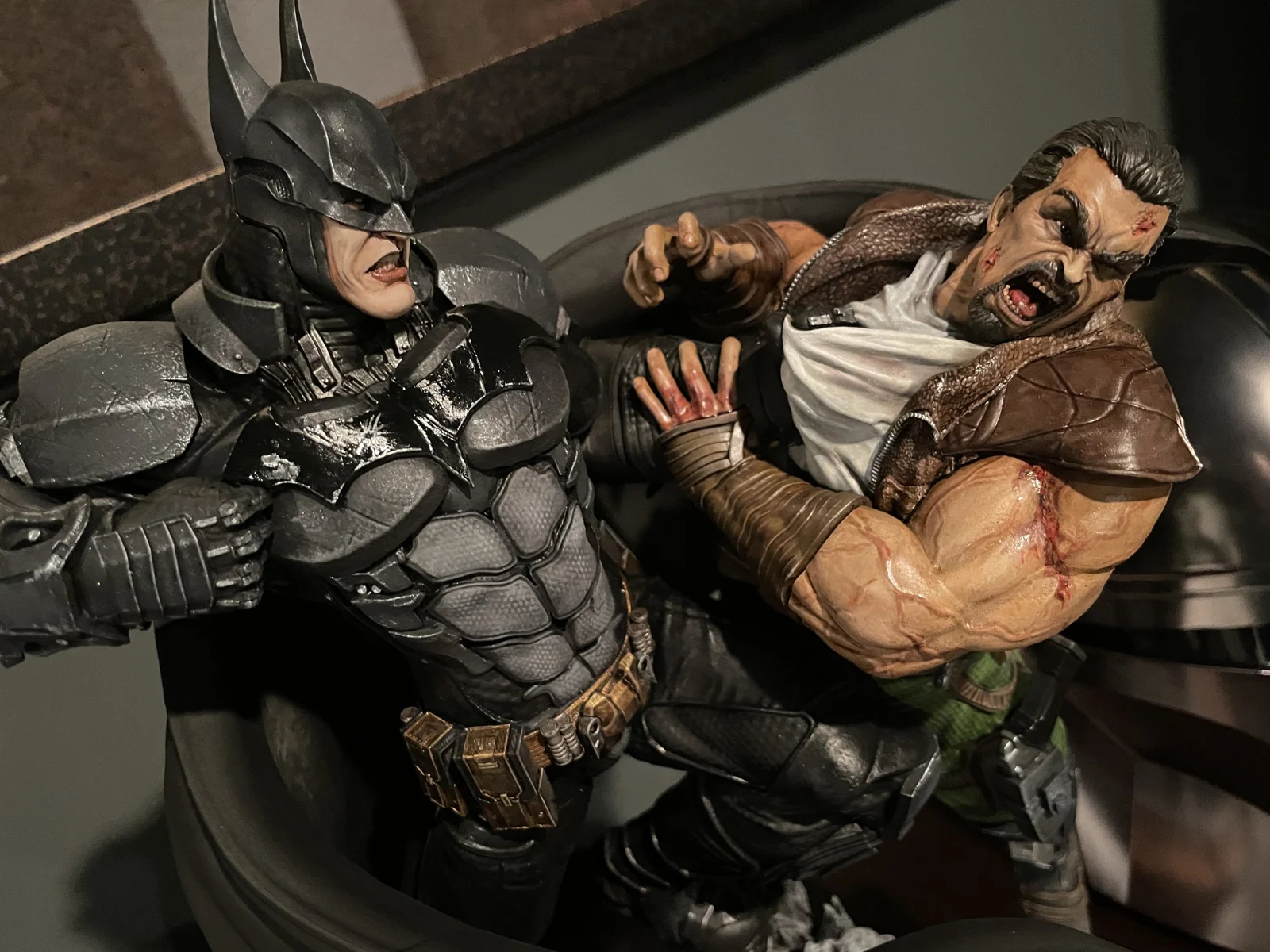 Jason's painted Batman and opponent collectible figures